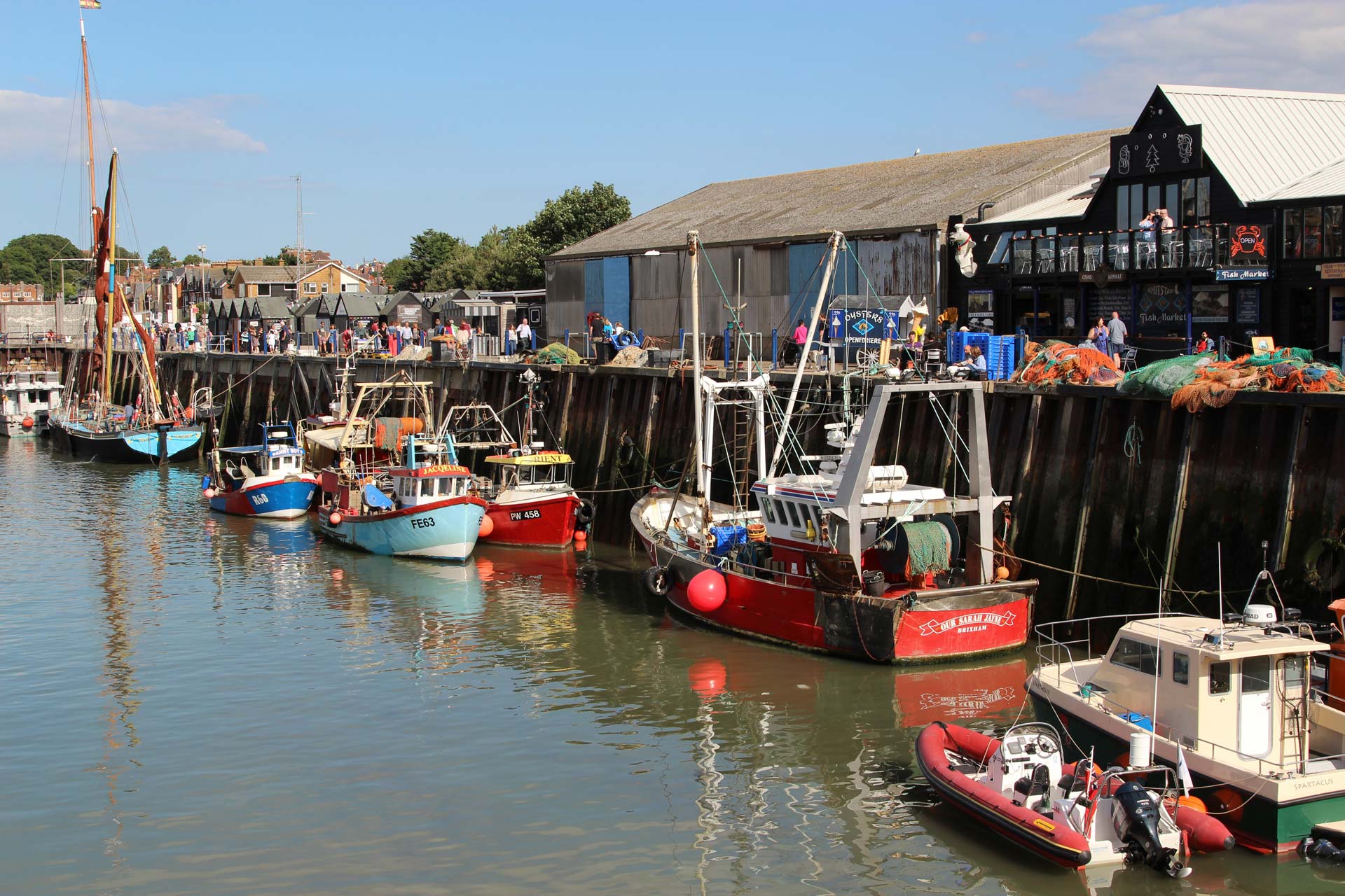 background fishing boats whitstable harbour whitstable 2